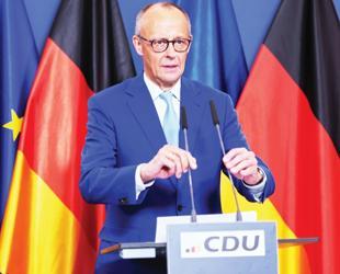 Merz under pressure after bruising state election loss-es