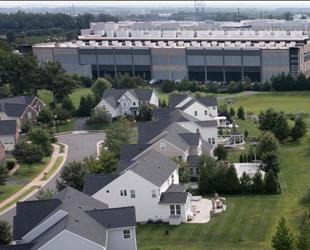 Amazon vows $1 billion for data center towns, decries myths