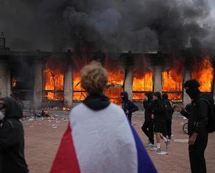 European stocks retreat as France violence spreads