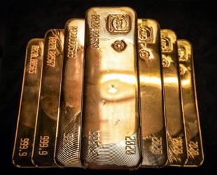 Rising oil prices and inflation weigh on gold