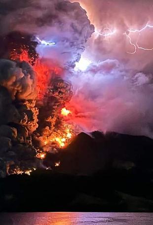 Thousands evacuated as Indonesia volcano erupts, causes tsunami threat
