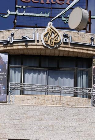 Israel forces raid Al Jazeera TV in West Bank, order 45-day closure