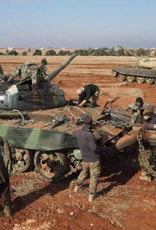 Syria authorities say armed groups have agreed to disband, merge under defense ministry