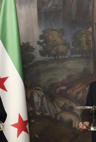 Syrian FM on Moscow visit says wants Russia by our side