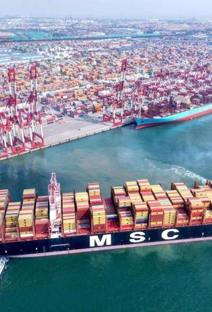 China says its exports jumped in July, beating forecasts