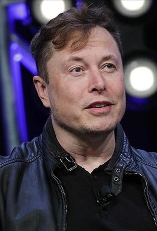 Musk says he plans to sue Apple