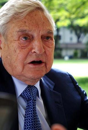 Trump urges criminal charges against George Soros, son