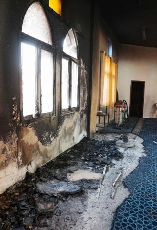 Israeli settlers torch West Bank mosque, scrawl hateful messages