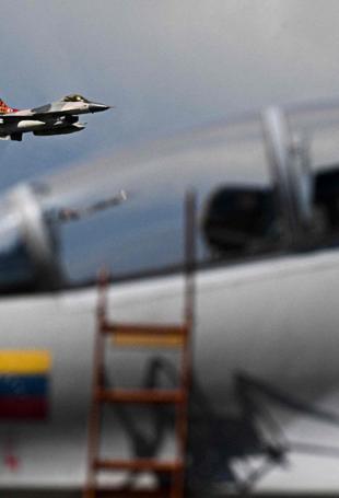 Trump ramps up Venezuela threats, warns airspace closed