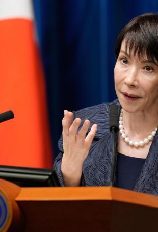 Shut up: Japan PM quotes manga in investment drive