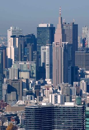 Japan revises economic data to show bigger contraction