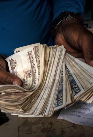 Cubas communist party postpones congress, citing economic crisis