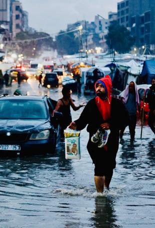 Fresh rains flood streets in war-scarred Gaza