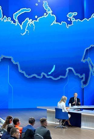 Putin hails Ukraine gains, threatens more, in annual press conference