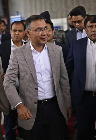 Prime minister hopeful Rahman arrives in Bangladesh