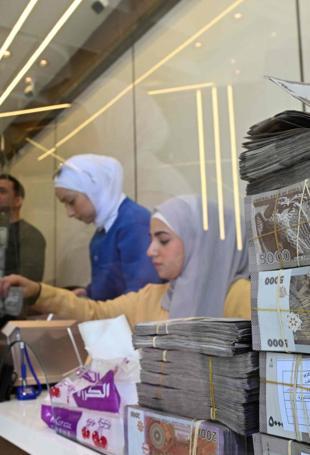 Syria to start replacing currency from January 1