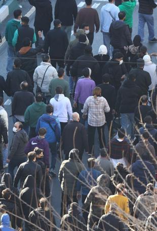 Iran president urges government to heed economic protests