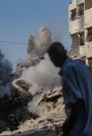 Gaza civil defense says Israeli attacks kill 13 including 5 children