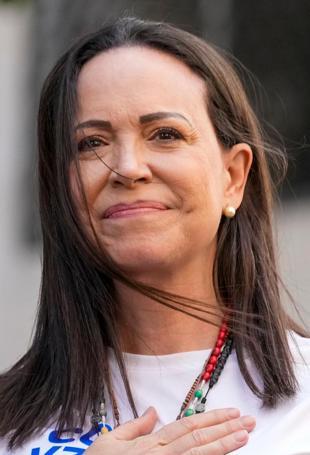 Trump sets meeting with Venezuelan opposition leader, Caracas under pressure