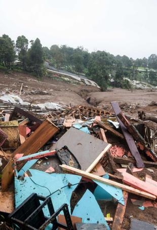 Indonesia resumes search for dozens missing in landslide