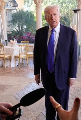 Trump hopeful of Iran deal after Tehran warns of regional war