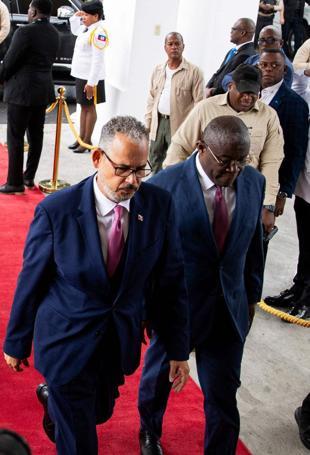 Haitis transitional council hands power to PM