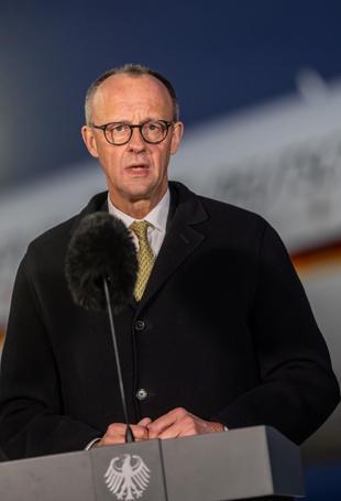 Germanys Merz arrives in China for talks on trade, security