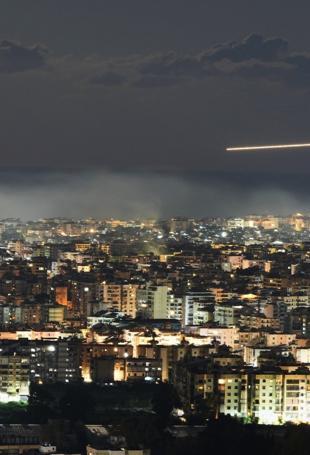 Israel hits Lebanon after Hezbollah fire, expanding Iran war