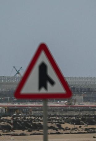 Qatar downs Iran warplanes, halts LNG production as Gulf crisis deepens