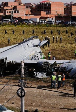 Police raid homes seeking banknotes after Bolivian plane crash