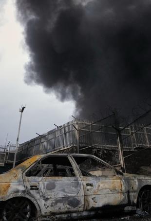 Tehran plunged into darkness by smoke from burning oil