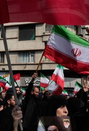 Iran threatens prolonged war as Trump says it is near defeat