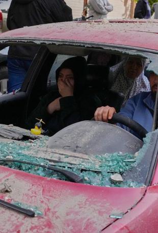 Israel expands strikes on Lebanon, cuts bridge over Litani river