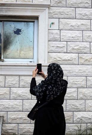 Israeli settlers burn buildings in attacks on West Bank villages