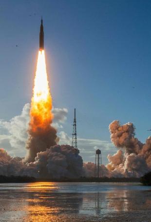 Astronauts begin NASA lunar mission after climactic blast-off