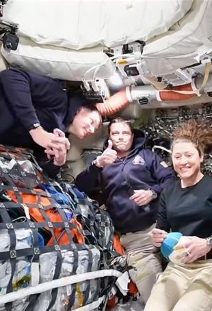 Artemis astronauts pass half-way point on way to Moon