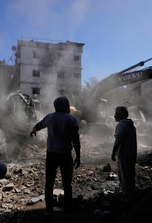 Raid hits Beiruts southern suburbs as Israel says striking Hezbollah