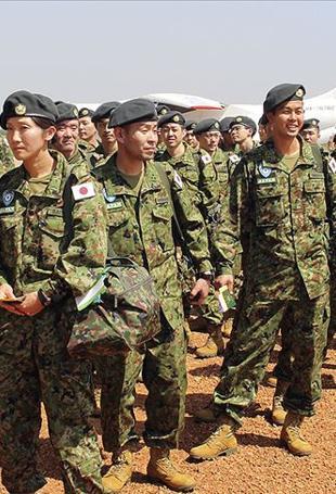 Japan aims to boost women troops as it struggles to enlist