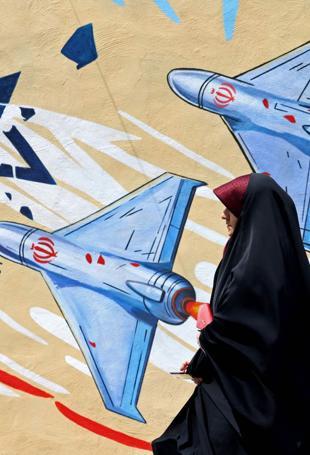 Tehran residents relieved but divided by Trump truce