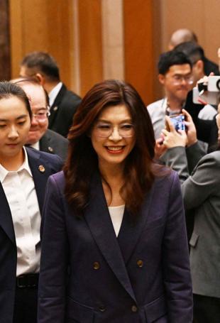 China says it will enhance exchanges with Taiwan