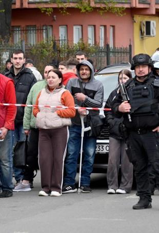 At least 6 killed after gunman opens fire in Ukrainian capital