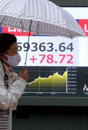 Japan spends more than $30 bn to prop up yen: Reports
