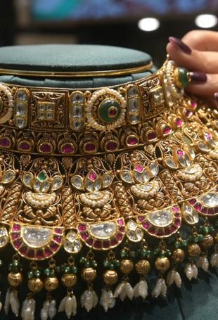 India hikes gold, silver duties to protect sliding rupee