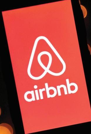 Airbnb expands into hotels, cars, groceries