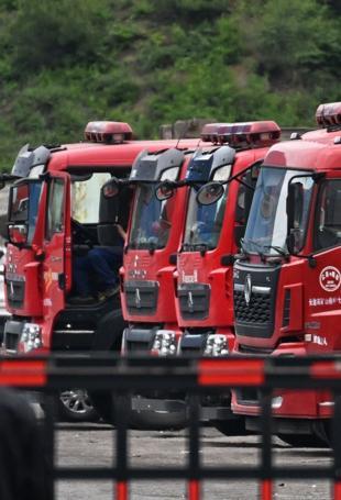 China rescuers search for missing after mine blast kills 82