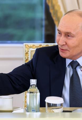 Putin to confront economy at Russian Davos, under threat of Ukrainian drones