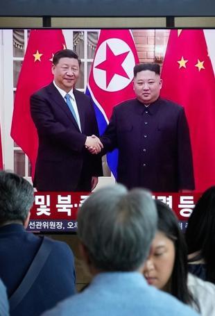Chinas Xi lands in North Korea for rare visit