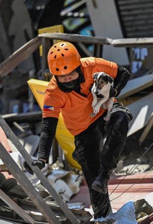 Outdoor hospitals, shaken communities as Philippine quake toll rises