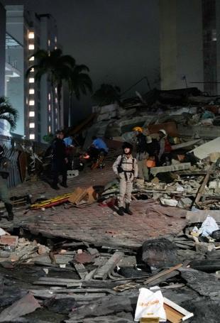 Venezuelans search for survivors after quakes kill at least 235