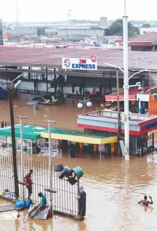 Floods paralyze Ghana capital, kill three